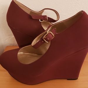 Ladies wine color shoes brand new .